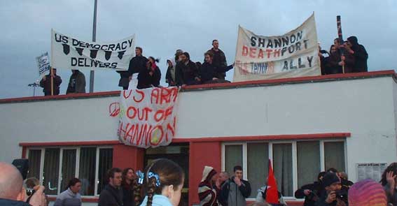 Anti war banners on roof of Shannon airport