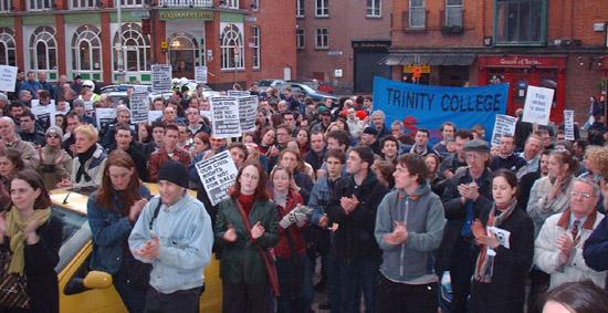 Crowd clapping at protest
